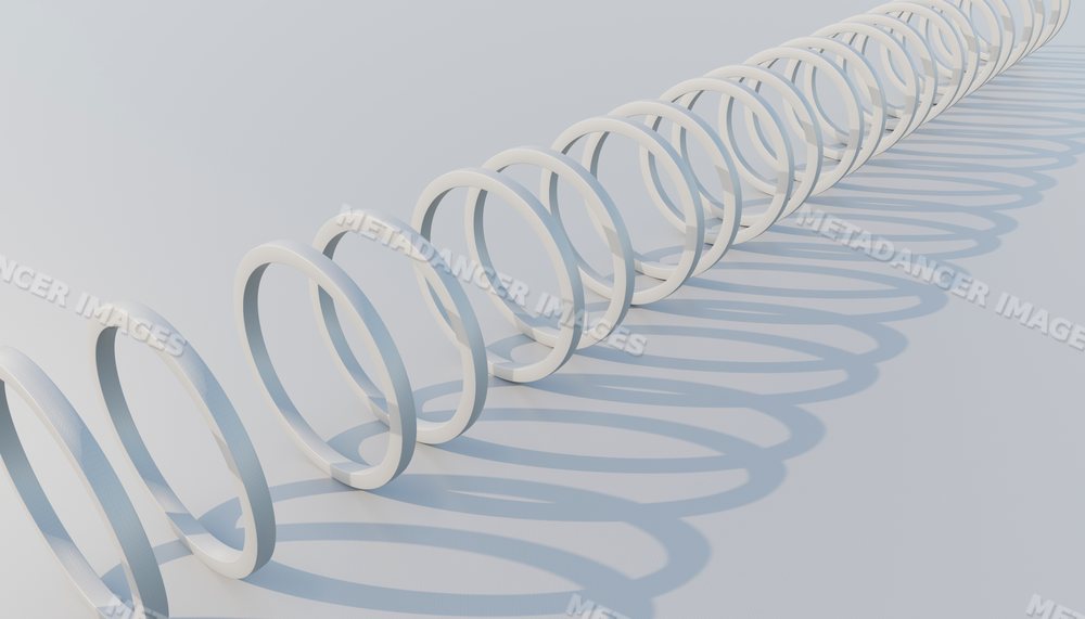 White continuous spiral ring casting repeating shadows on a white