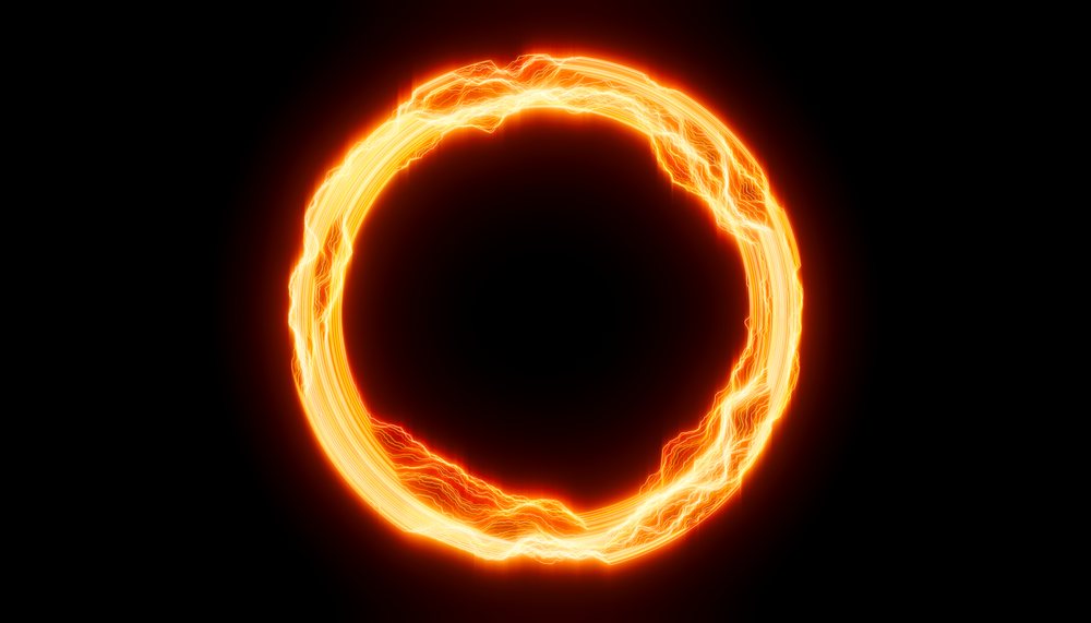 Electric glowing ring with vibrant orange light and energy currents on black background.