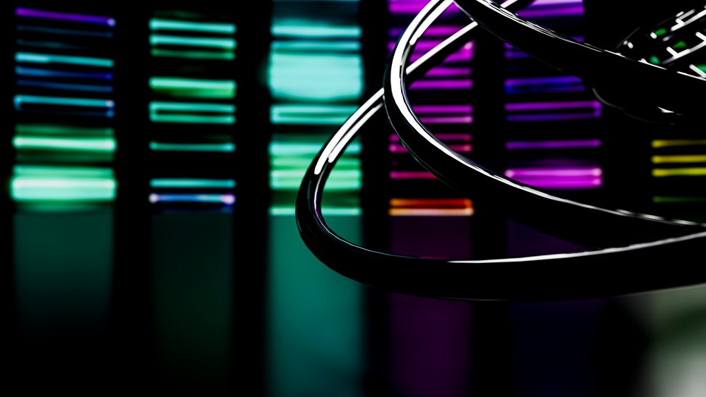 Close-up of a DNA double helix model with colorful genetic code bars in an indoor scientific setting.
