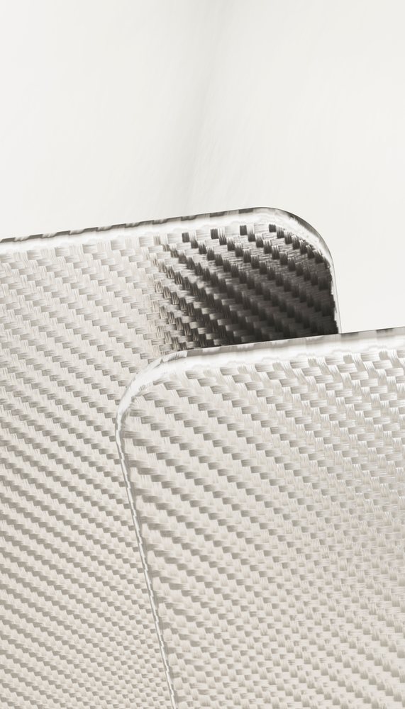 Close-up image showing the black and gray carbon fiber material with detailed woven weave pattern and reflective surface texture.