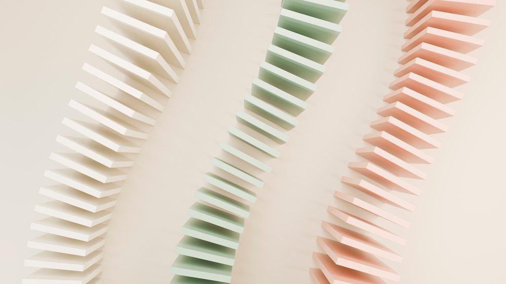 Vertical stacks of white, green, and pink pastel rectangular blocks form a minimalist abstract 3D geometric design with soft shadows.