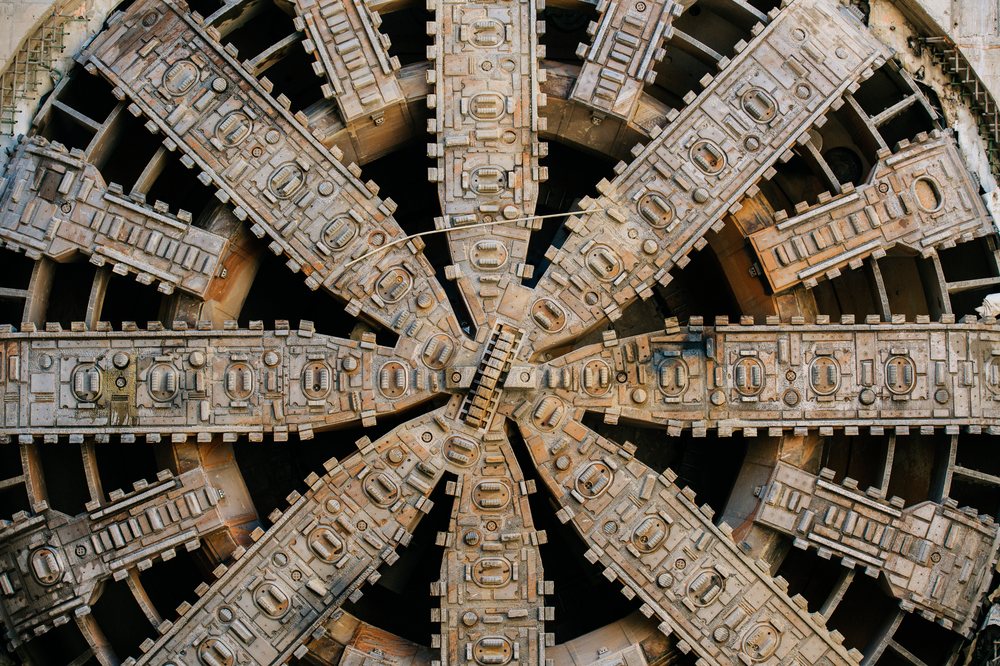 Close-up view of the circular cutting face of a tunnel boring machine used for underground drilling, USA.