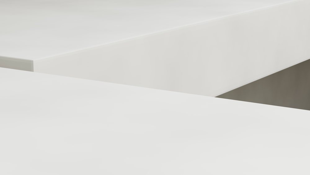 White minimalist modern architecture with geometric shapes and clean lines outdoors under daylight.