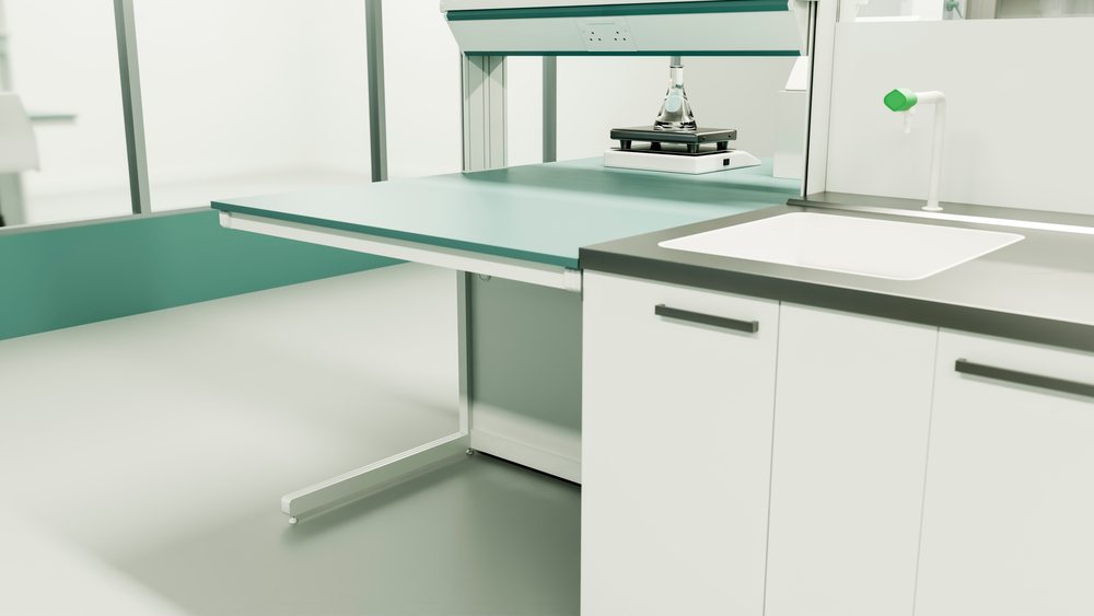 Clean laboratory bench with flask on shaker near sink in a sterile scientific research environment.