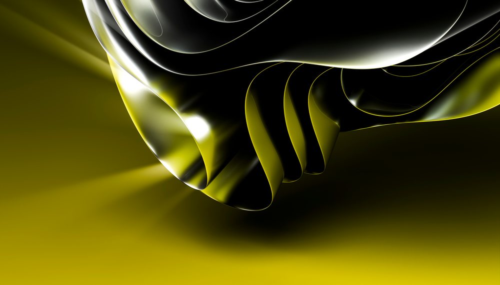 Abstract fluid form with smooth black and yellow reflective surfaces on dark background.