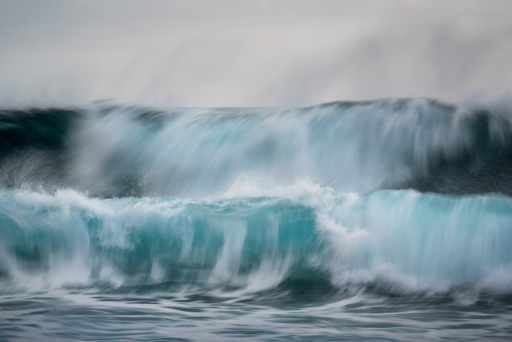 Powerful ocean waves crash and splash with motion blur, Madeira Island.