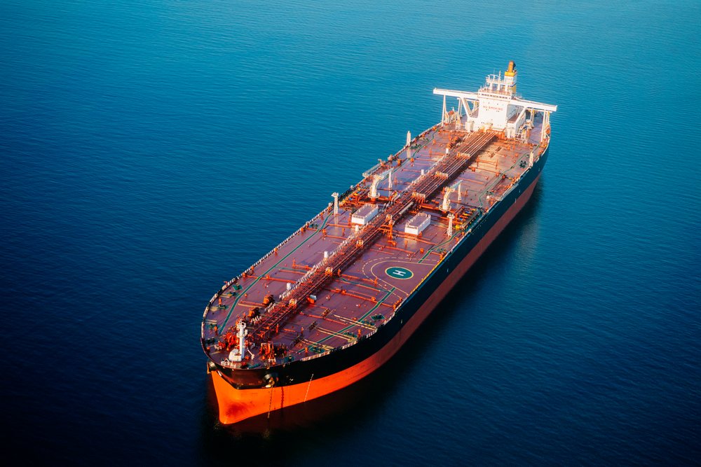 oil tanker floating on calm ocean water, Port of Long Beach, CA, USA.