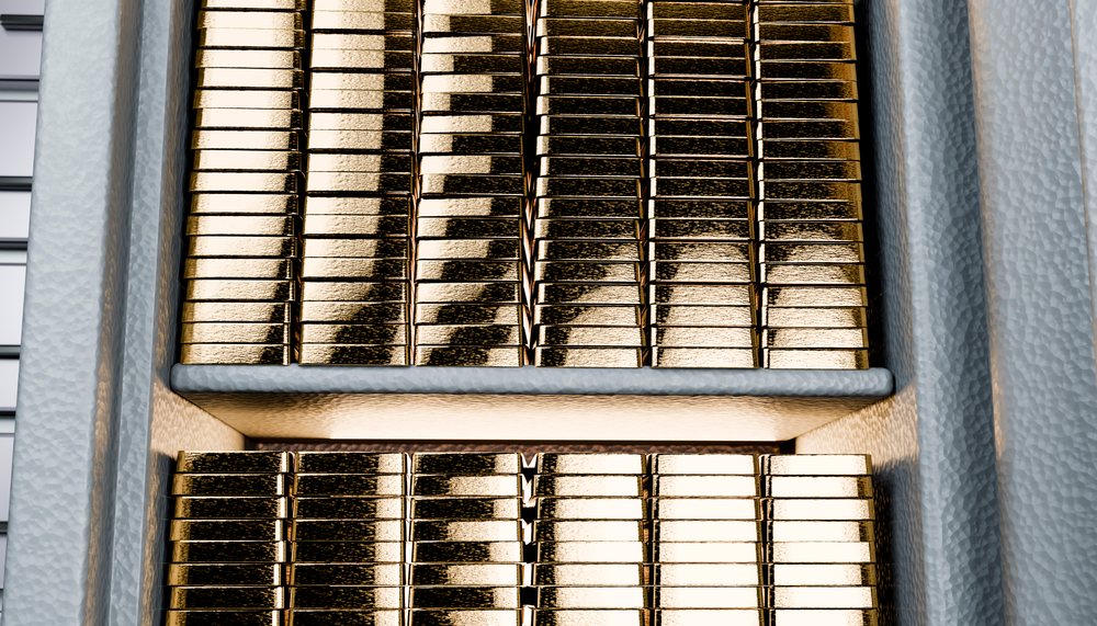 Stacked rows of gold bars with metallic shine arranged securely symbolizing wealth and investment.