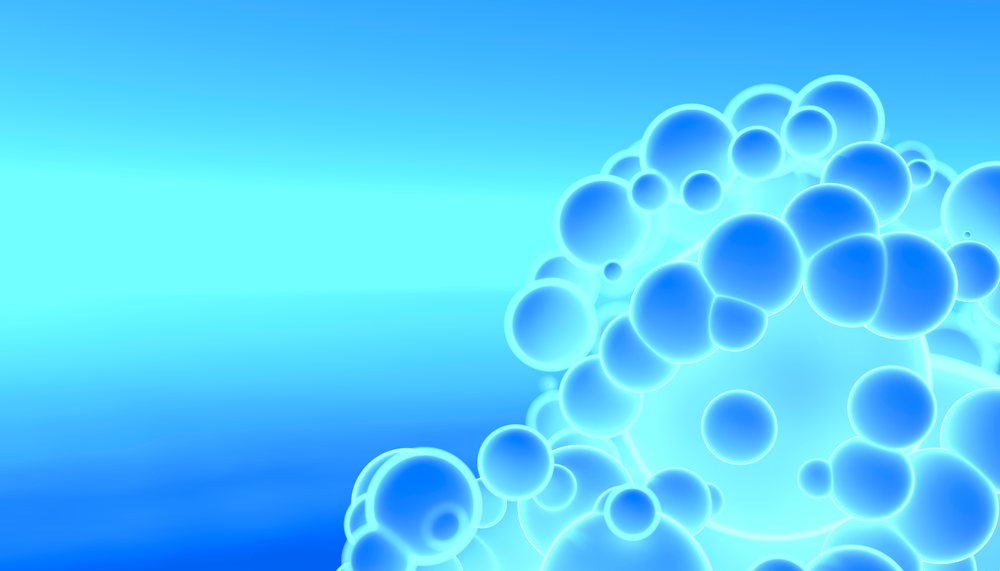 Blue glowing abstract spheres clustered on a blue gradient background in a digital modern design.