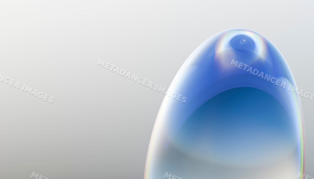 Close up of a shiny transparent bubble with colorful reflections