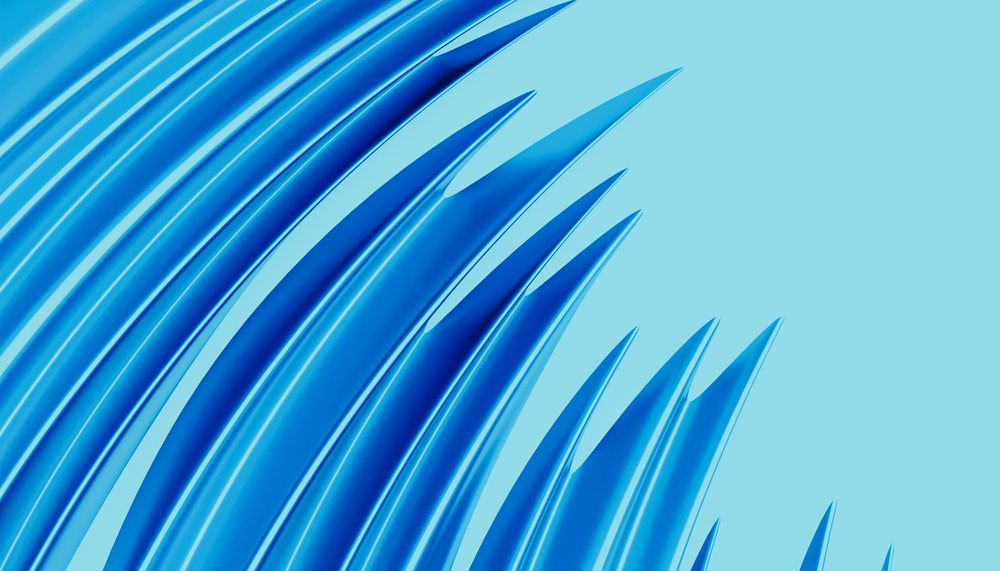 Blue abstract curved shapes flowing on a bright blue smooth background.
