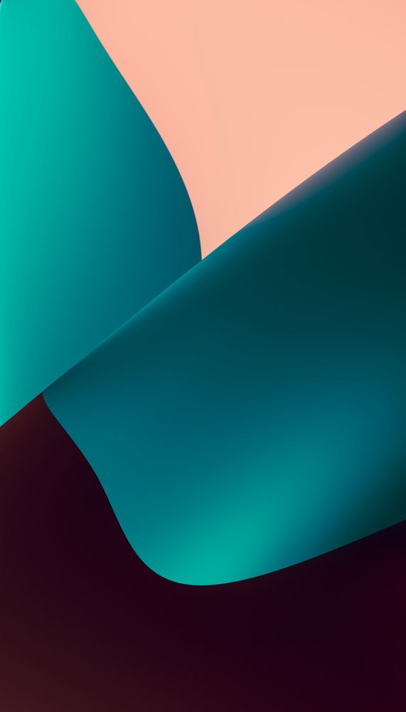 Abstract curved shapes of teal and peach folded paper create a modern and minimalist design composition.