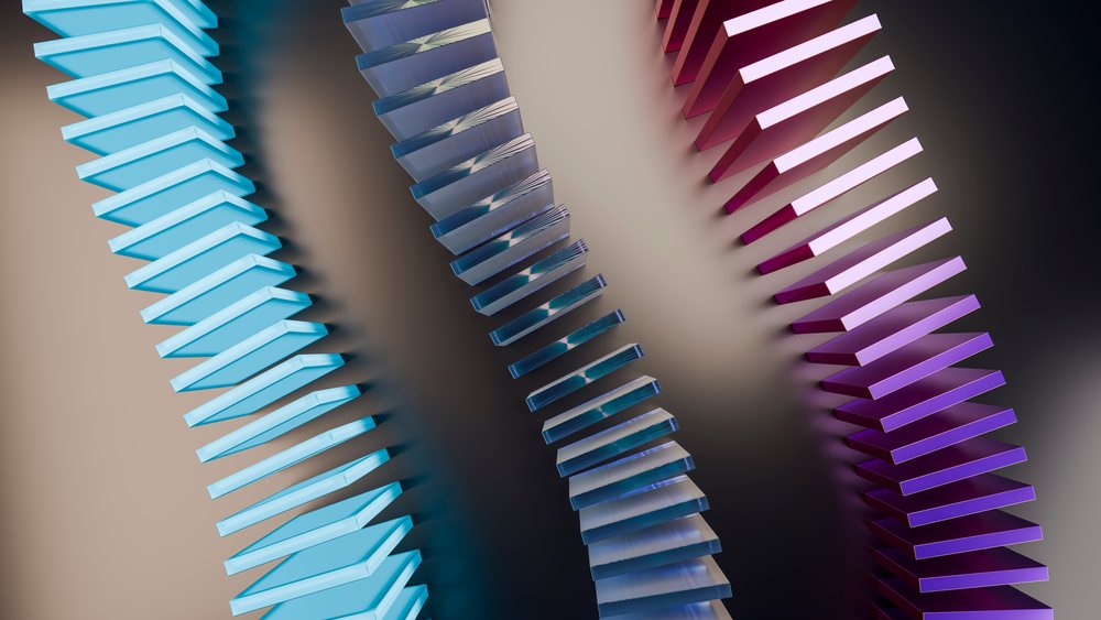 Abstract illustration of three multi-colored domino chains falling in a curved pattern on a gradient background.