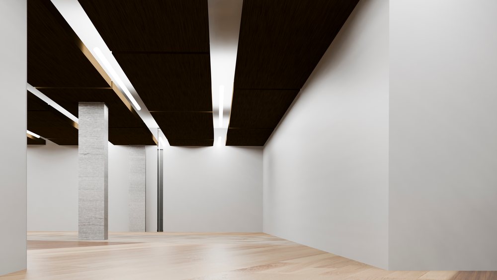 Empty modern interior room with wooden flooring and white walls.