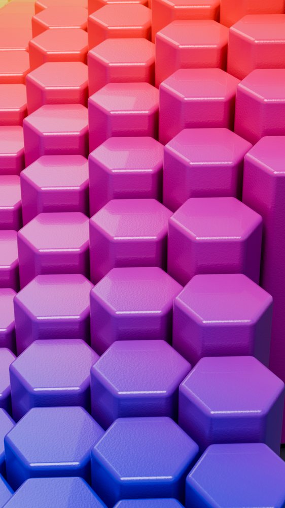 Digital illustration of repeating 3D hexagonal shapes with a smooth, glossy surface and a pink to purple to blue color gradient.