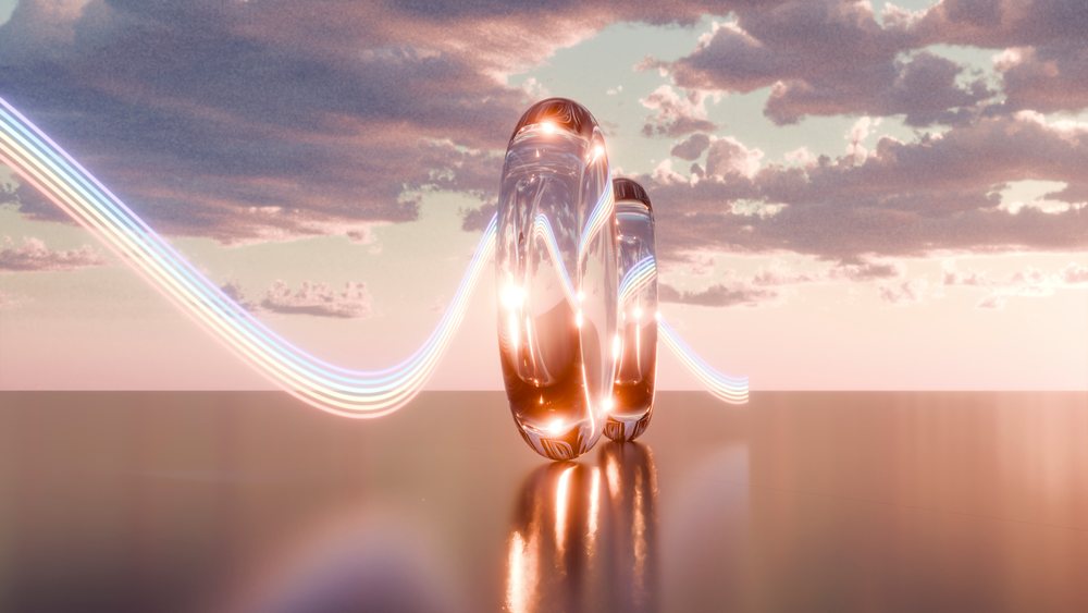 Abstract digital artwork showing two glossy glass rings with vibrant light trails against a pink sky with clouds at sunset.