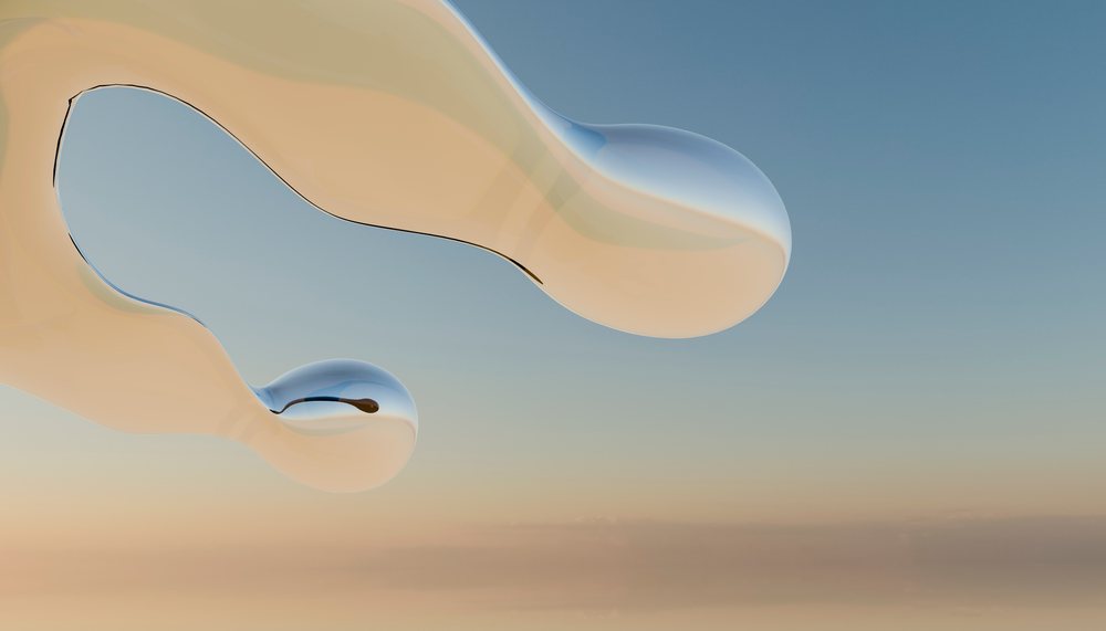 Abstract digital art showing smooth curved liquid shapes floating