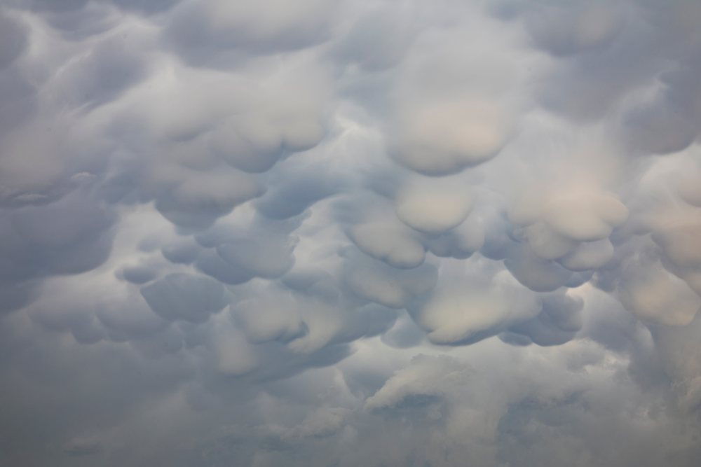 Mammatus Clouds appear over Olney Springs, forming a distinctive storm cloud pattern in the sky, Storm Chasing, Weather, Environment, Colorado, USA.