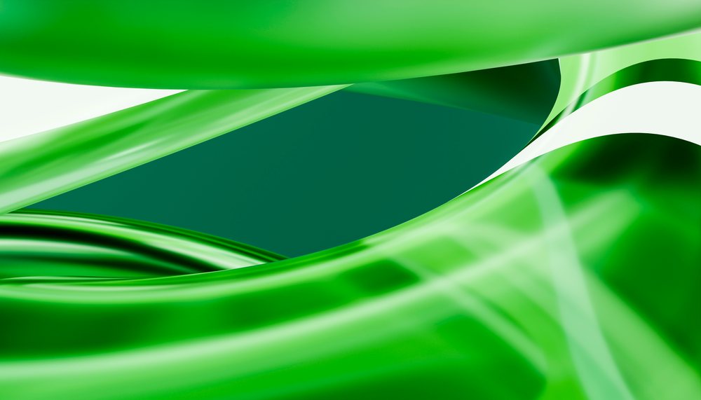 Glossy green curved abstract shapes forming smooth flowing ribbons in a digital 3d rendering.
