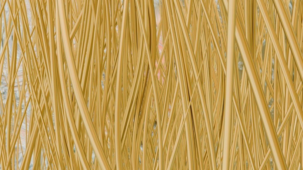 Yellow uncooked spaghetti pasta strands densely packed in a close-up view.