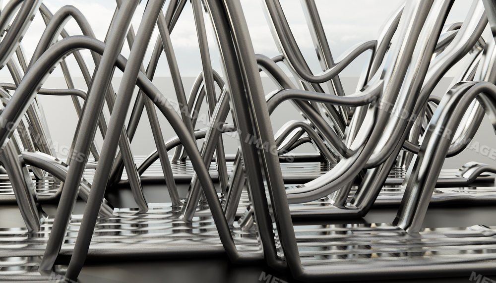 Close-up of an abstract modern sculpture with interwoven shiny metal