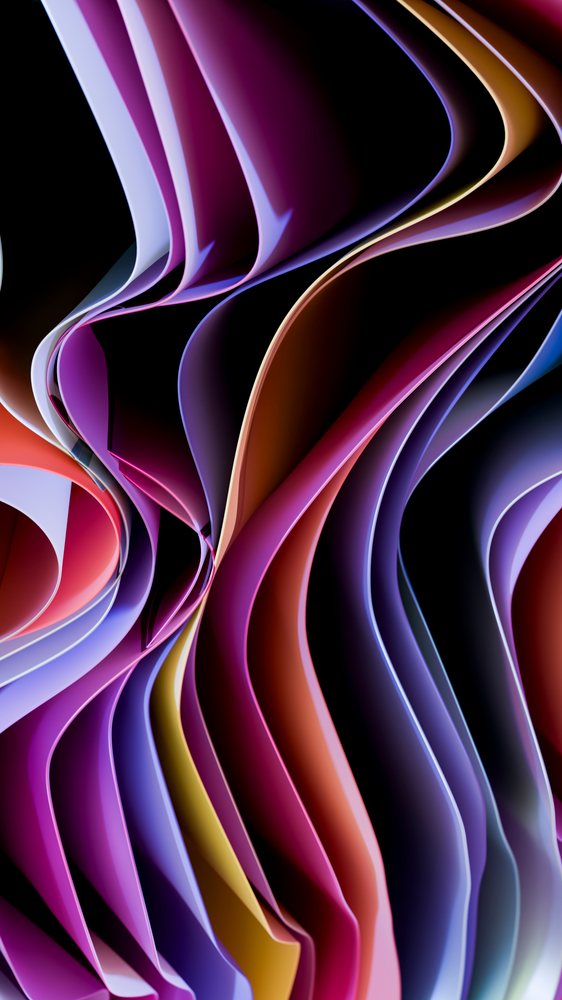Colorful folded paper sheets arranged in abstract curved waves against a black background.