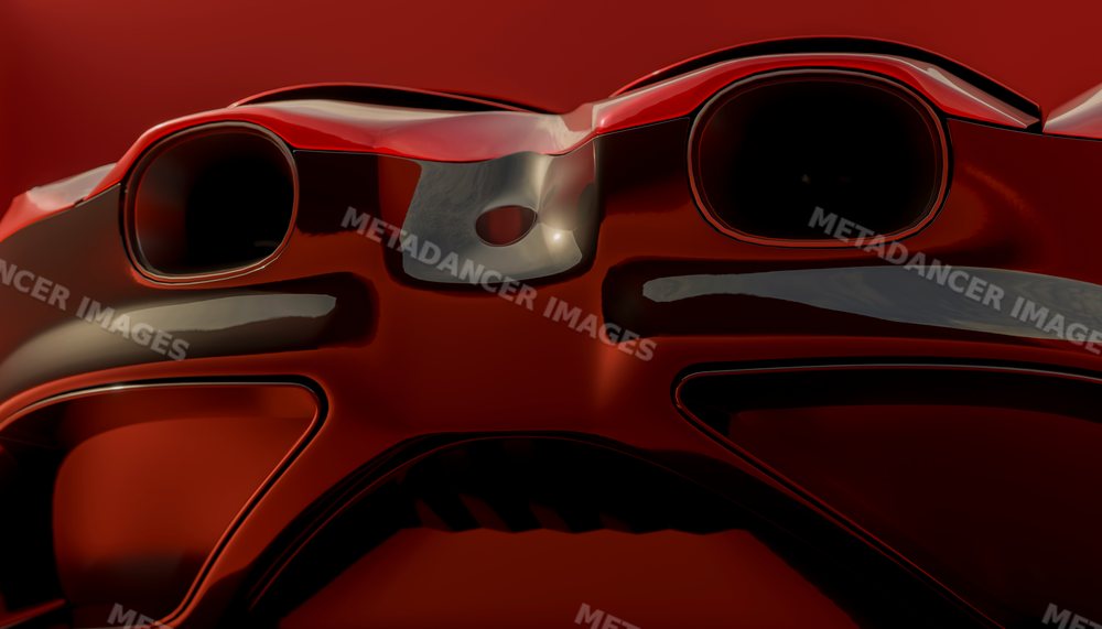 Close-up front view of a red vehicle with shiny headlights and grill