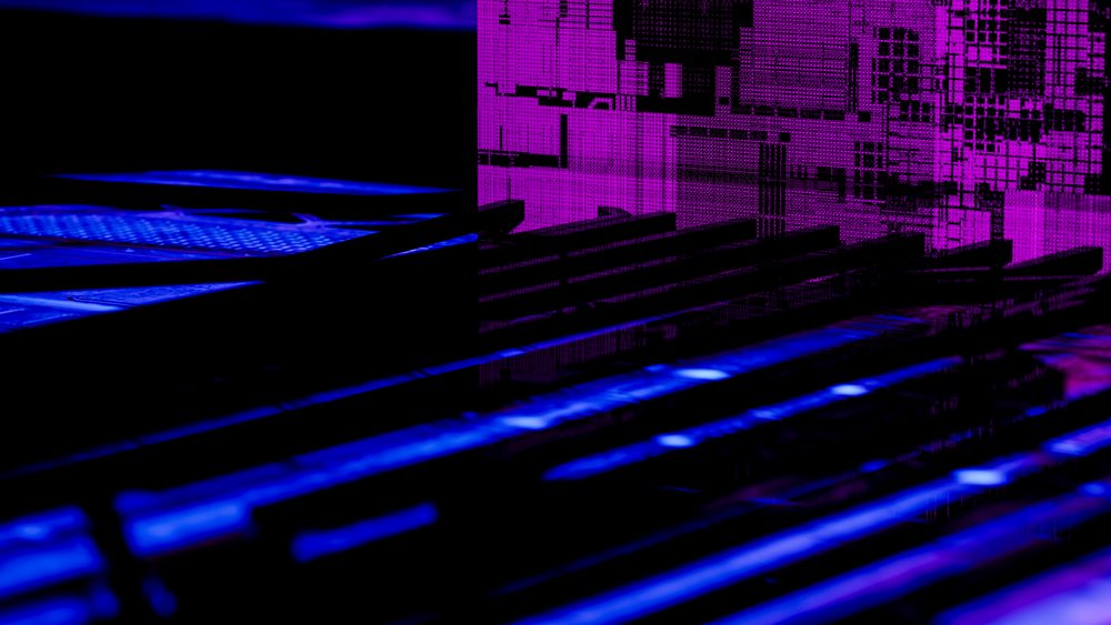 Close-up illustration of a digital circuit board with purple and blue lighting showing electronic components and microchip patterns.