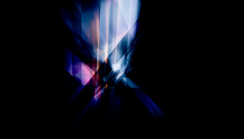 Abstract digital art depicting vibrant blue and purple light streaks and geometric shapes on a dark background.