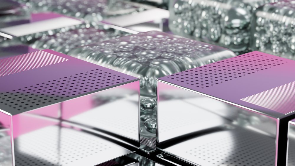 Square perforated metallic cubes with liquid bubbles form an abstract, reflective modern 3D design.