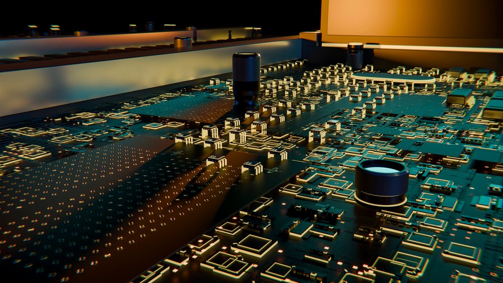 Close-up of a circuit board featuring capacitors, resistors, and microchips under ambient lighting.