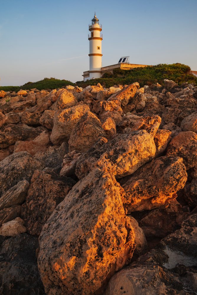Lighthouse on Cabo de las Salinas rocky coast, Landscape, Lifestyle, Mallorca, Spain.