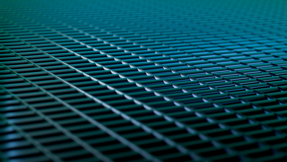 Close-up of a blue metal grid pattern forming a repeating geometric design on an industrial surface.