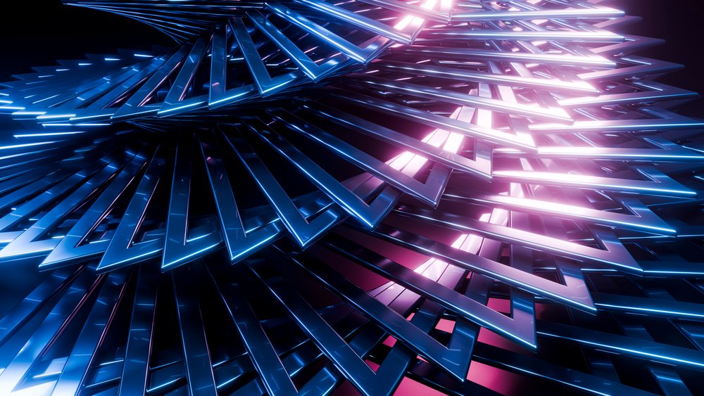 Close-up of blue metallic triangular shapes forming a spiral pattern with pink lighting accents and reflective surfaces.
