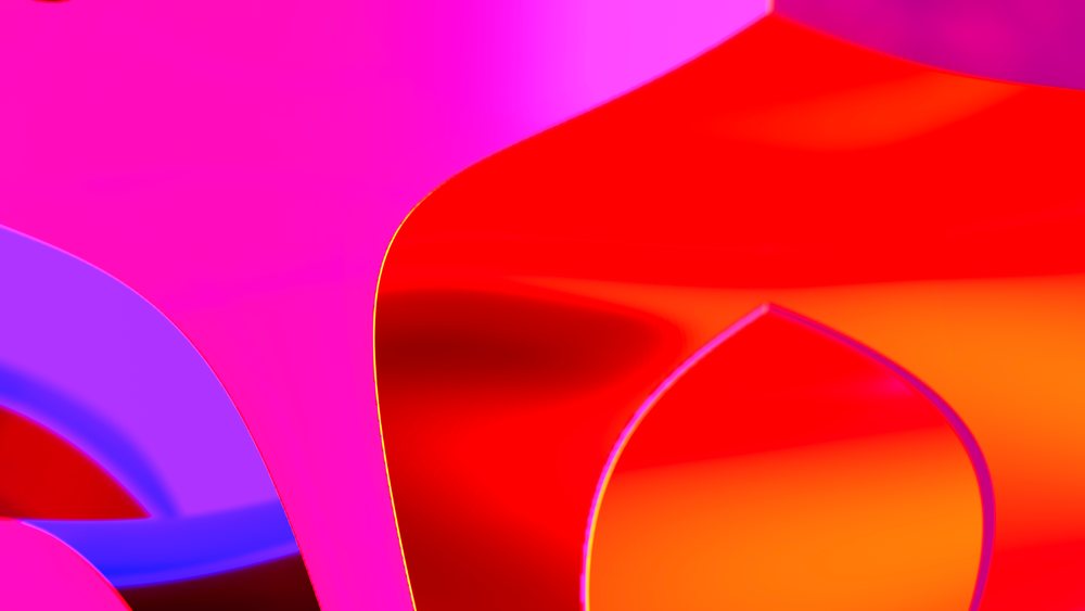 Abstract colorful shapes with organic curves and smooth surfaces in red, pink, purple, and orange hues creating a vibrant artistic composition.