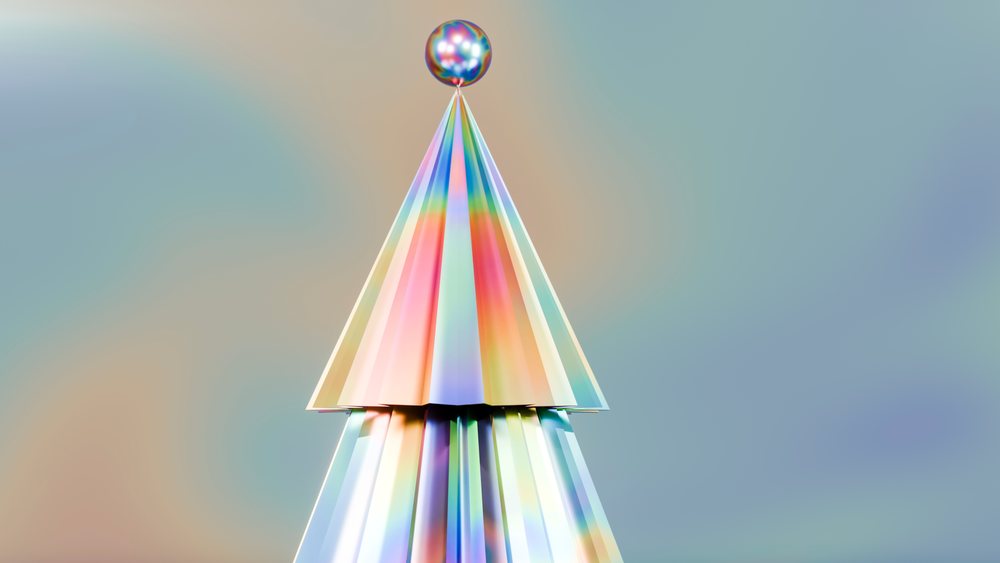 Stylized abstract Christmas tree with rainbow multicolor geometric shapes forms a festive holiday ornament topped by a sphere.