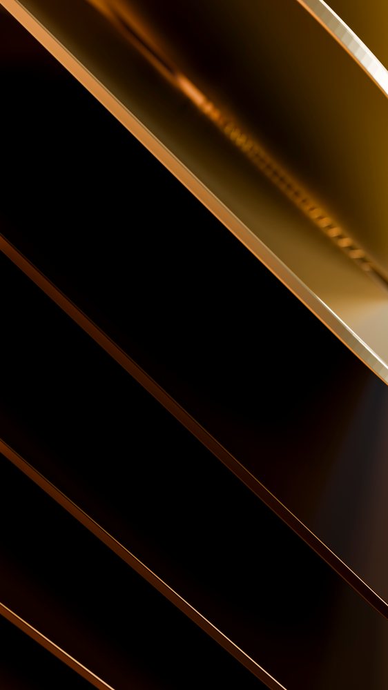 Close-up of stacked dark chocolate bars with smooth glossy surfaces and rich brown color.