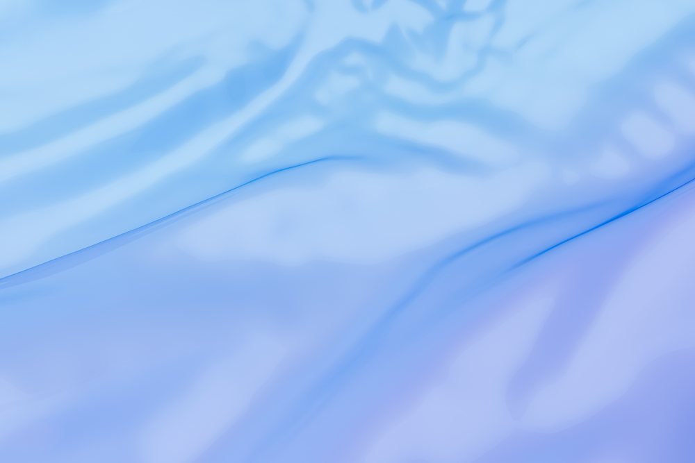 abstract smooth blue gradient background with soft waves and fluid texture.