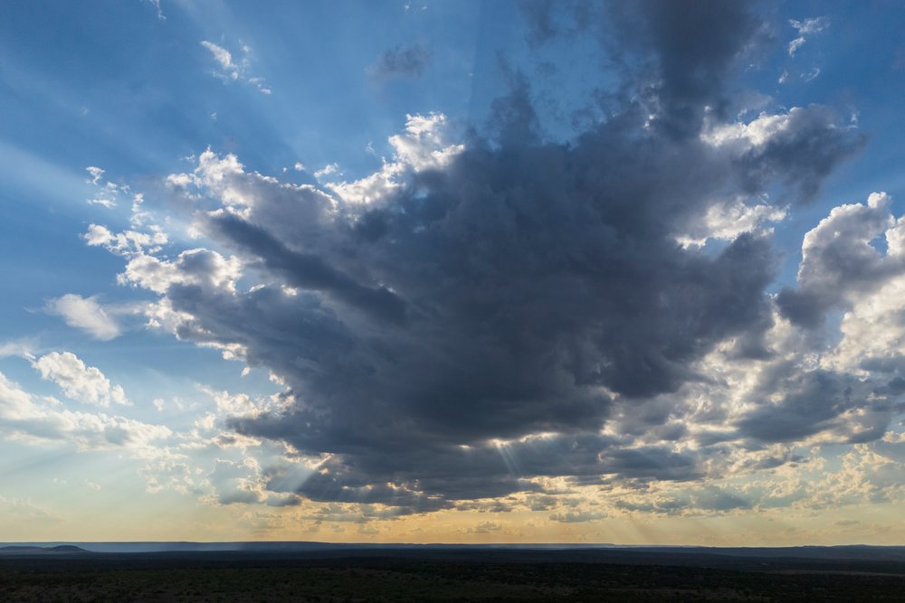 Crepuscular Rays shine through dramatic clouds over the Great Plains landscape, Storm Chasing, Weather, Environment, Silverton, Texas, USA.