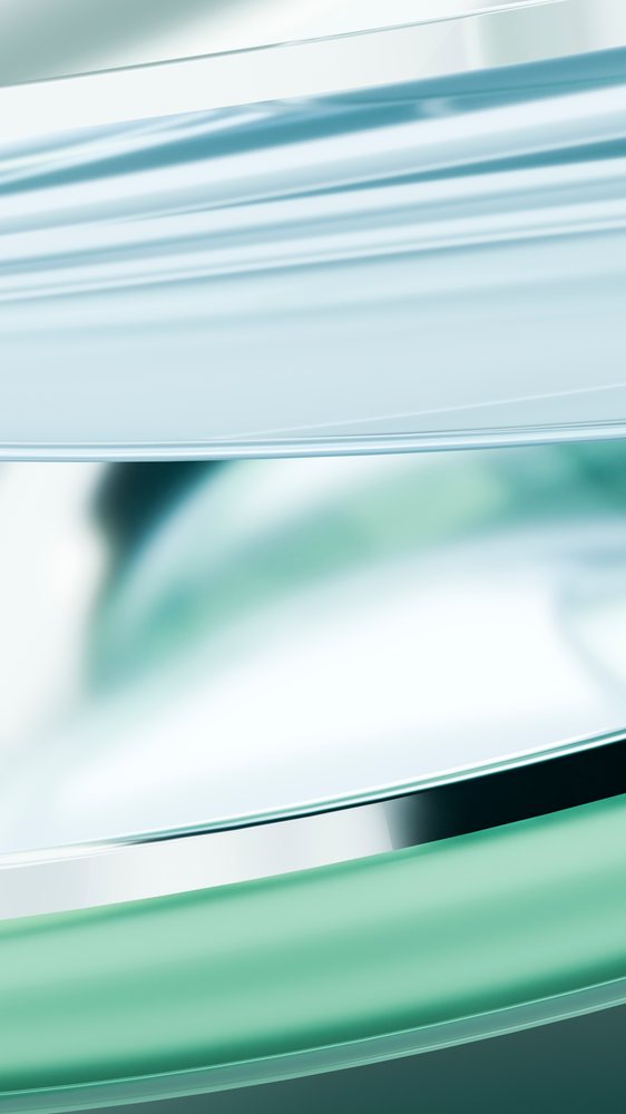Abstract digital illustration featuring smooth, curved blue and green translucent shapes with light reflections.
