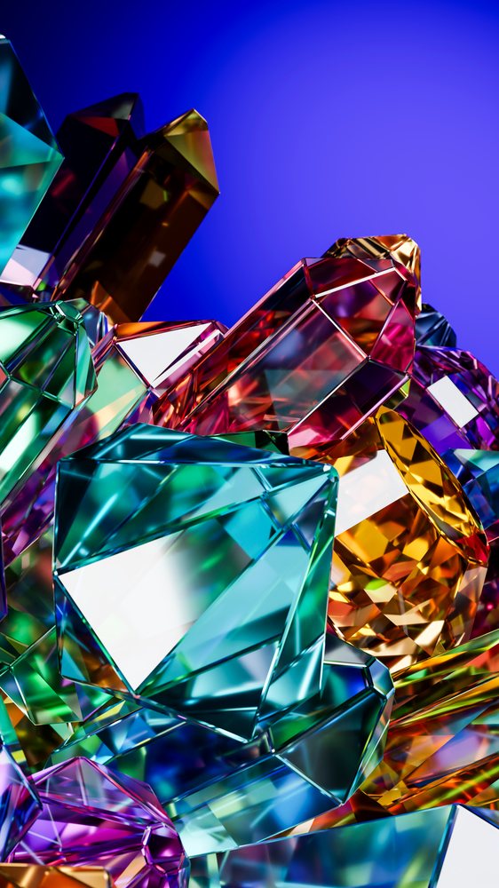 Digital 3D illustration of a cluster of colorful faceted crystals with smooth angular surfaces and vibrant reflections against a blue background.