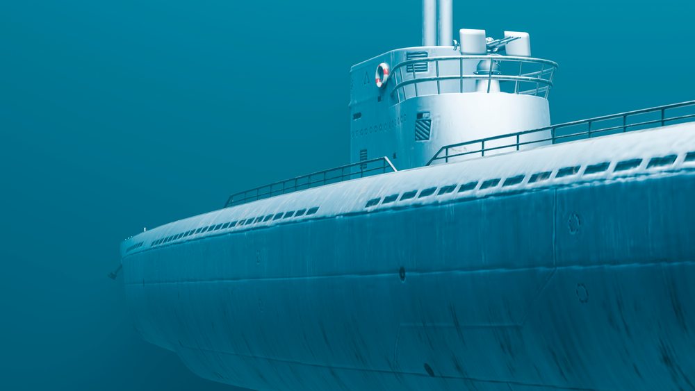 Submarine hull and conning tower equipped with navigation and defense equipment underwater in the ocean.