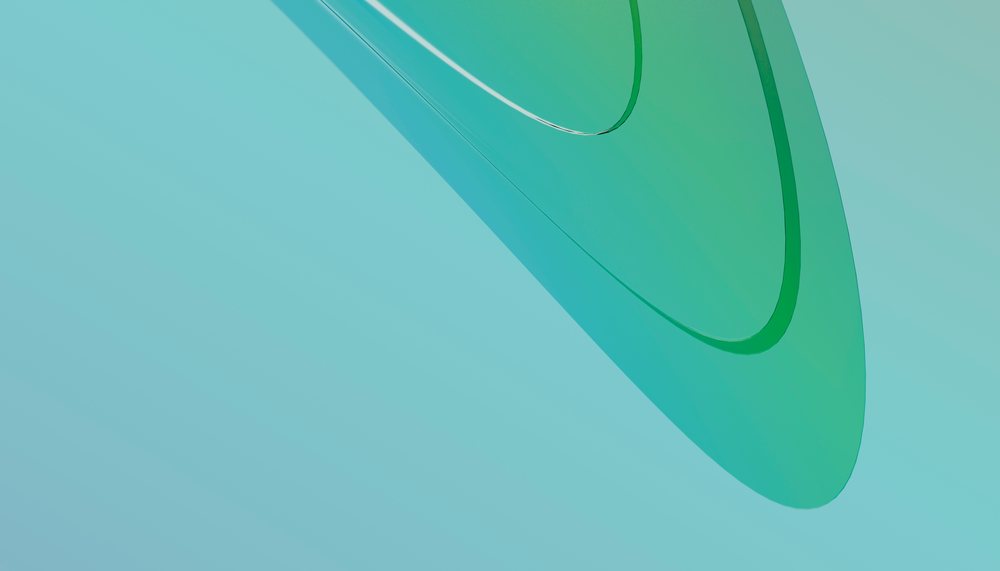 Green curved glass object with shiny reflection on smooth blue gradient background.