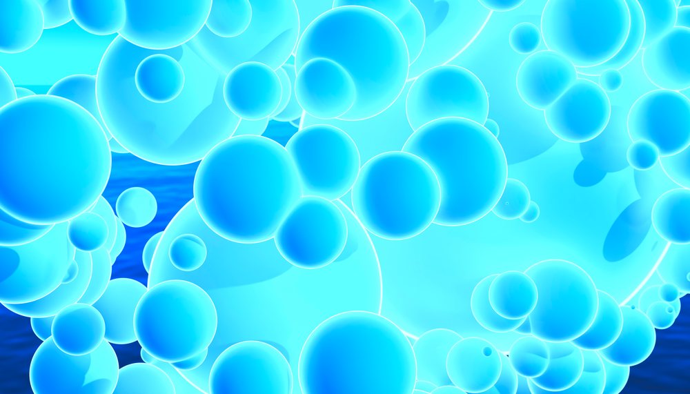 Blue glowing spheres floating in an abstract digital composition with a blue background.