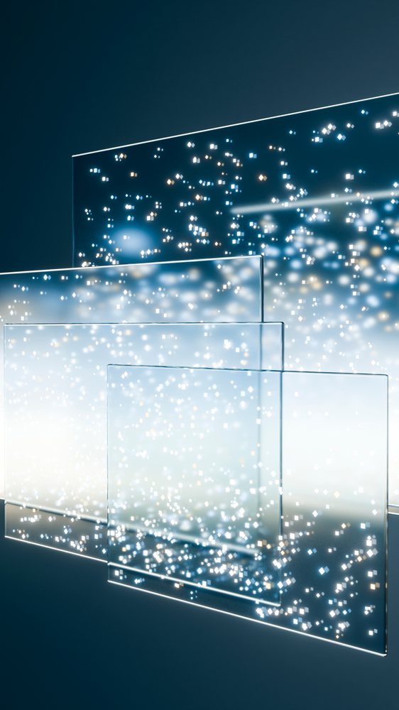 Multiple transparent glass panels float in space with glowing white and warm light particles against a dark blue background.