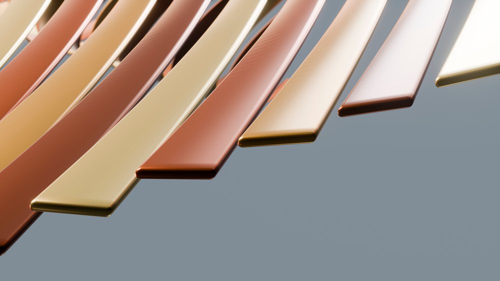 Glossy rectangular color swatches in shades from dark brown to light beige arranged on a gray background.
