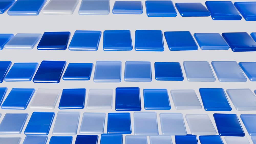 Rectangular blue and white glass tiles with a glossy smooth finish arranged in repeating horizontal rows.