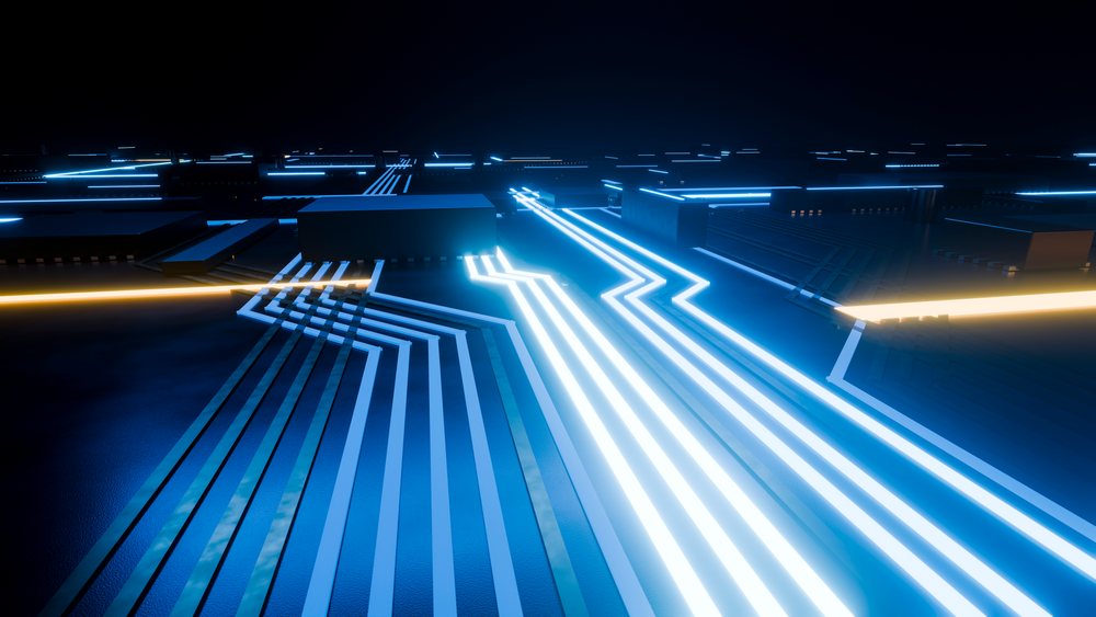 Glowing blue and orange lines trace a futuristic electronic circuit board with microchips in a dark environment.