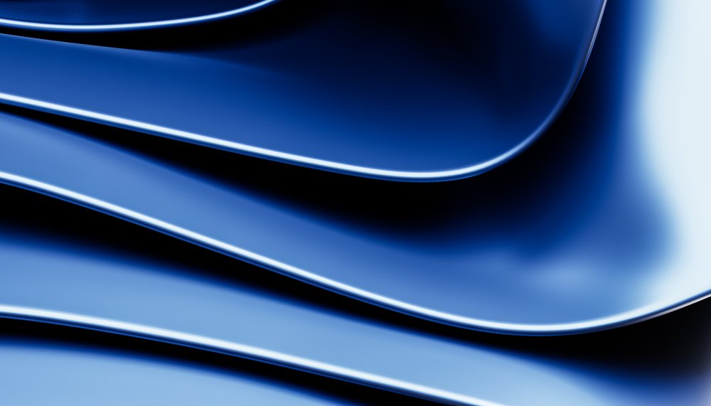 Abstract blue curved surfaces with glossy texture form flowing wave shapes over a gradient background.