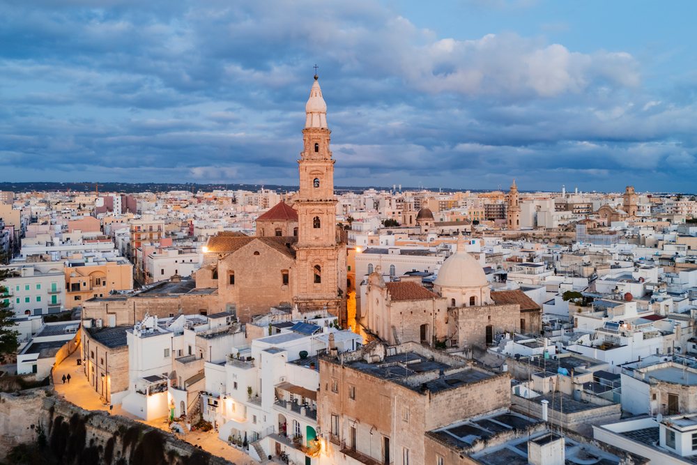 Cathedral Basilica of Maria Santissima della Madia illuminated at Dawn, Monopoli, Puglia, Italy.